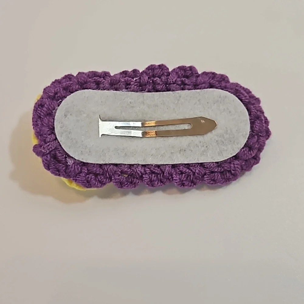 Hand Crafted crochet hair clip handmade  purple with yellow flower snap clip bow